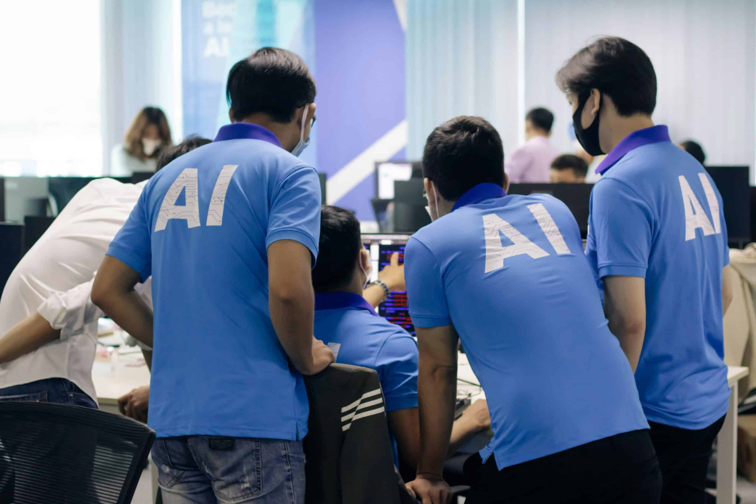 How should evaluators test AI systems (as opposed to models)?